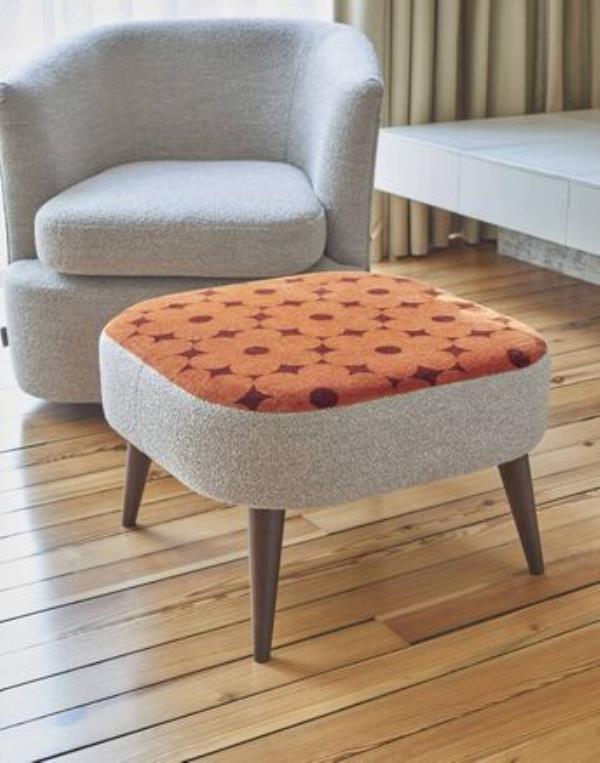 Orla Kiely's footstools offer the perfect pop of mid-century style and colour for your living room. 